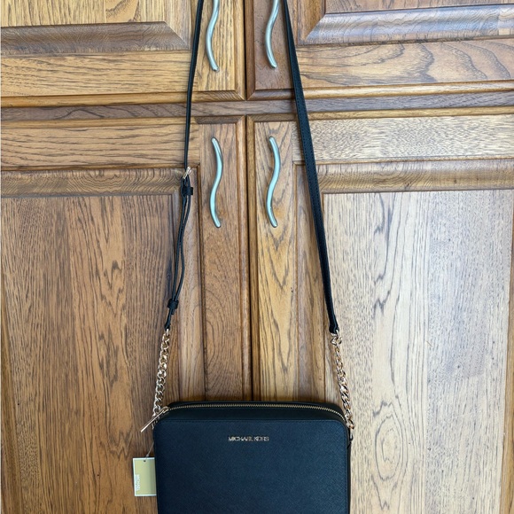 Michael Kors Handbags - NWT Michael Kors Black Jet Set Crossbody Bag